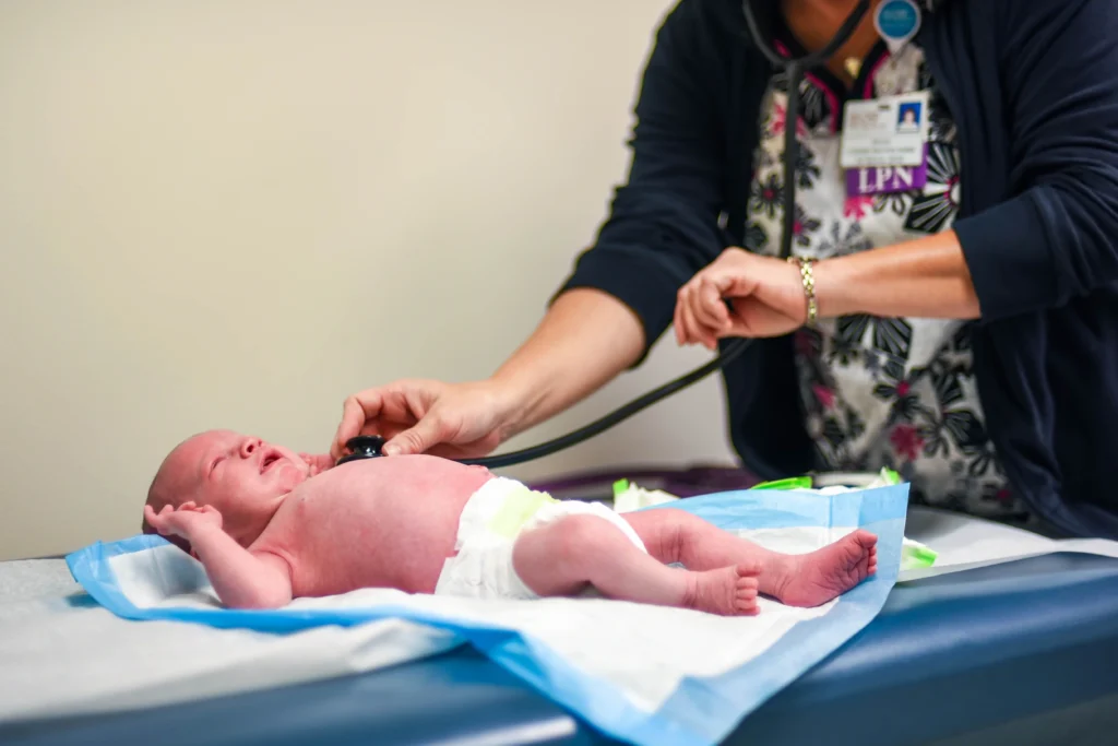Newborn baby getting a checkup at the pediatrician’s office - Neonatal Sepsis - A Complete Guide - KareOne Family Support